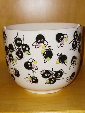 Hot Topic White Ceramic Bowl with Black Soot Sprite Design and Pink/Green Stars